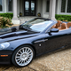 Illustration for article titled Why Buy A Used M3 When You Can Get A Sexy V12 Aston Martin Convertible?